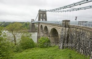 The suspension bridge over the Menai Strait links the island of Anglesey to the mainland of Wales.