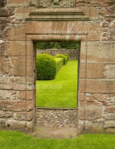 Doorway into the walled garden beside the ruins of Edzell castle, in Scotland.