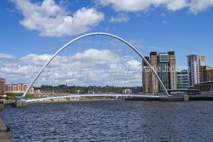 Gateshead millennium / blinking eye bridge, a pedestrian bridge across the Tyne River in teh city of Newcastle-upon-Tyne / Newcastle, in Northumberland, England.