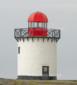 The lighthouse at Burry Port, in Carmarthenshire, Wales, is on the bank of the Loughor estuary.