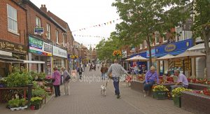 Pedestrians and shoppers in Bridge Street shopping in the town centre of the British town of Congleton in Cheshire, England.