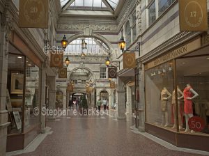 Shops and people in the Interior of the historic Mall, Grosvenor shopping centre, in the British city of Chester in Cheshire, England.