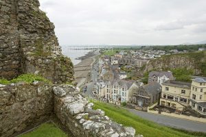 The Welsh town of Criccieth and its beach viewed from the nearby castle.