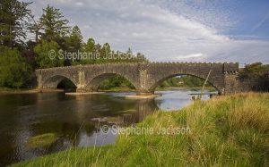 Arched stone bridge over the River Shiel in Scotland.