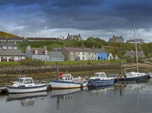 Harbour and waterfront cottages at the village of Helmsdale in Scotland.
