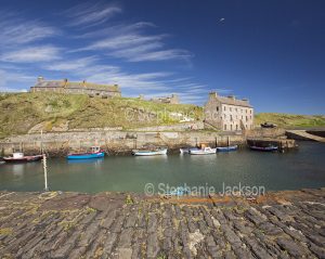 The harbour and an old warehouse at the village of Keiss in Scotland.