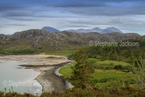 Landscape dominated by beach and mountains near Poolewe, Scotland