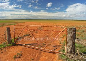 Gate - entrance to the vast red plains of outback NSW Australia