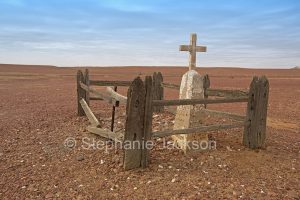 Solitary grave on barren treeless stony plains at Mount Dutton in northern / outback South Australia.