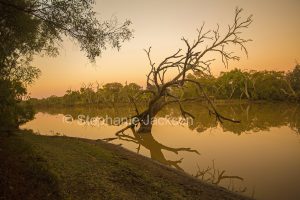 Sunset at the Warrego River in Cunnamulla in outback Queensland Australia.